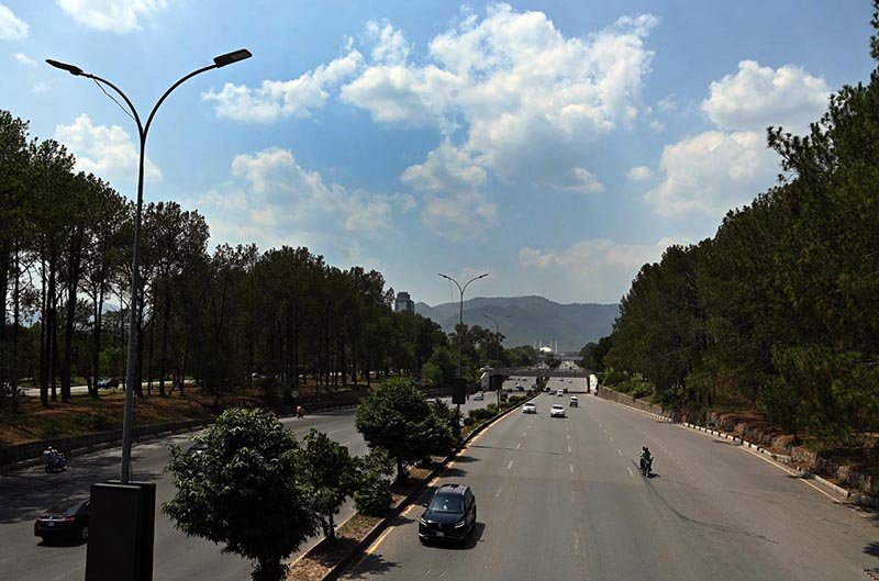 Clouds Envelop Margalla Hills Amid Traffic in Islamabad