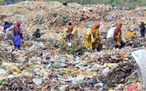 Gypsy Women Scavenge for Valuables in Latifabad Garbage Heaps
