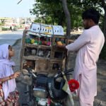 Vendor Sells Colorful Birds in Islamabad’s I-9/4 Area