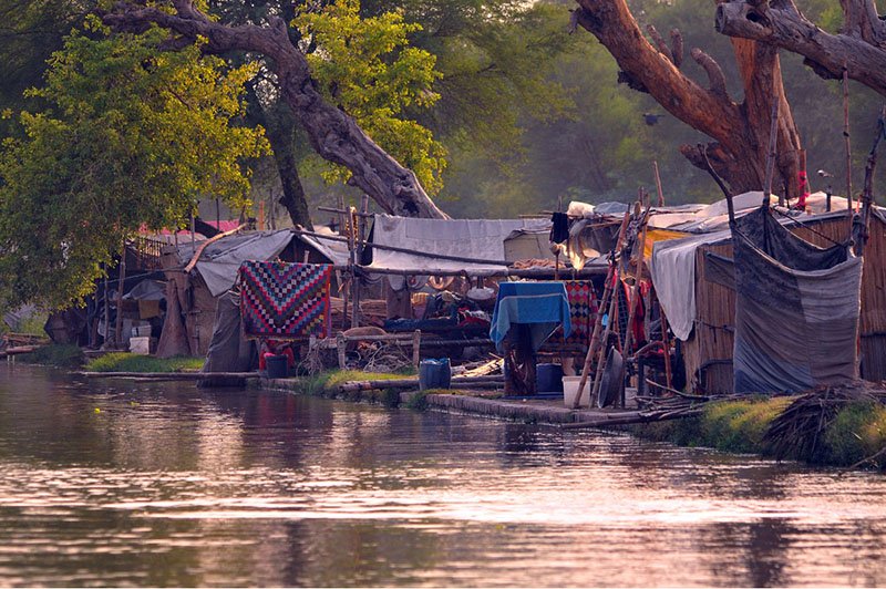 Informal Settlements Along Nau Bahar Canal Transform Riverside Environment