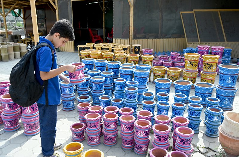 Traditional Clay Pottery Captivates Young Visitors in Gilgit Market