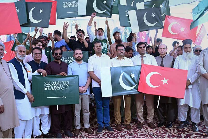 Flags Raised in Lahore to Celebrate Mecca Defence Agreement
