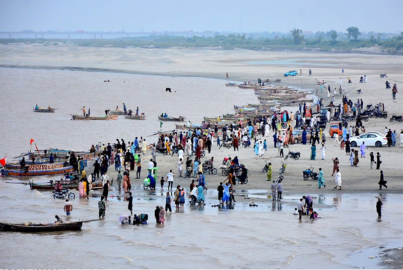 Indus River’s Rising Water Levels Attract Families Amid Monsoon Rains