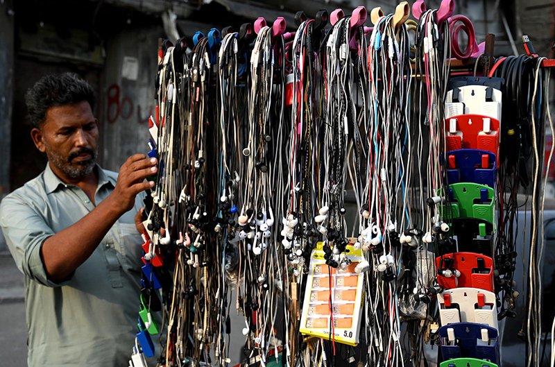 Street Vendor Markets Mobile Accessories in Lahore’s Bustling Streets